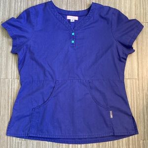 XL Koi brand Scrub Top. Used in great condition! 🦋